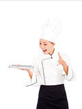 amazing cook woman chef holding tray and showing something