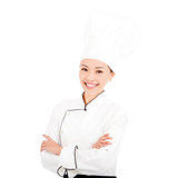 young pretty woman chef standing in studio