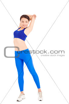 smiling Asian woman stretching her arm and smiling