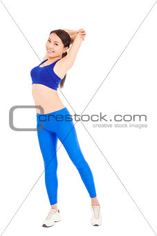 Pretty Asian woman stretching her arm and smiling