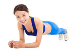 beautiful sporty woman doing core exercise on the floor