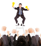 excited businessman yelling with success business team