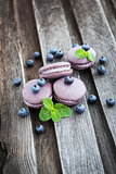 Violet french macarons with blueberry and mint