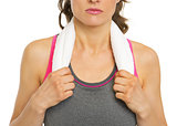 Closeup on fitness young woman with towel