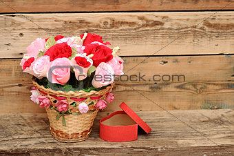 bouquet paper flower in a basket with gift box