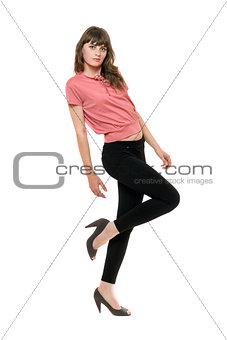 Young playful woman in a black leggings. Isolated