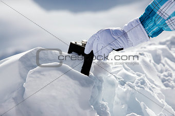 Hip flask in snow