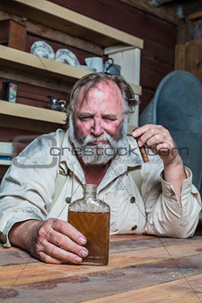 Unhappy Western Man at Table