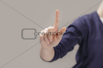 young female hand to select or touch something on transparent screen