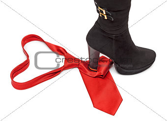 Boot steps on a necktie