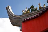 historical decorations on top of chinese temple