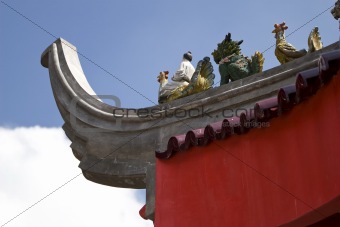 historical decorations on top of chinese temple