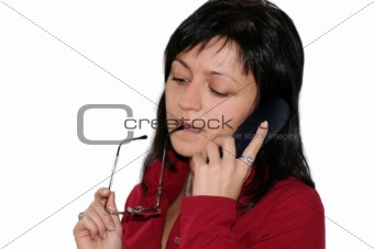 woman in office is calling by phone