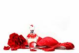 Perfume bottle,  rose and red brassiere