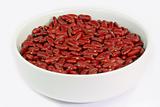 Red Kidney Beans in a white bowl on bright Background