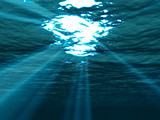  Underwater , sea surface with sunbeam shining through