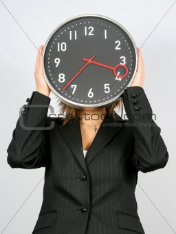 businesswoman and clock