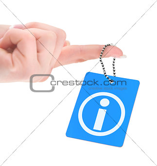 hand holding information tag