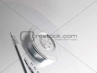 Model of metal plate and reading head of a hard disk on a neutral background
