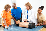 Adults Learning First Aid CPR