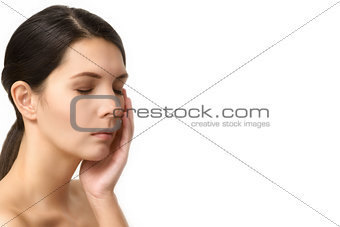 Tired woman relaxing with closed eyes