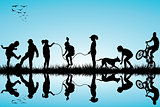 Group of children silhouettes playing