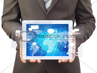 Businessman in a suit holding a tablet computer