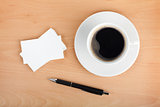 Blank business cards with coffee cup and pen