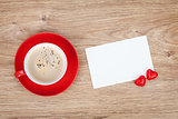 Blank valentines greeting card and red coffee cup