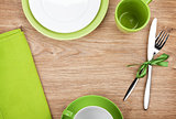 Kitchen utensils over wooden table