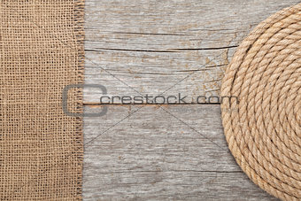 Ship rope on wood and burlap