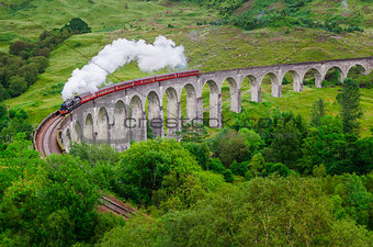 Detail of steam train on famous Glenfinnan viaduct, Scotland