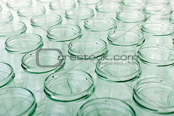 Lots of empty glass jars background