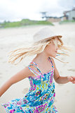 Cute young girl having fun at beach