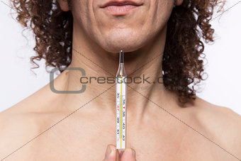 Man holding thermometer