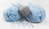 blue and gray wool yarn ball
