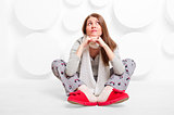 girl in studio in slippers and pajamas