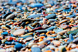 colored pebbles on the beach