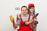 Working with dad - happy boy helping his father