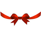 Red bow with ribbon on the gift or heart