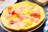 Omelette with vegetables and prosciutto