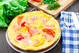 Omelette with vegetables and prosciutto