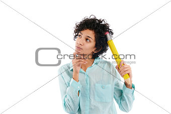 pensive businesswoman scratching head with big pencil