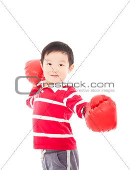 Portrait of a cute sporty boy in boxing gloves