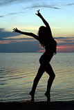 Silhouette of a sexy young woman