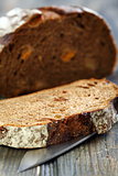 Rye bread with dried apricots close-up.