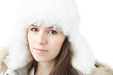 female wearing winter hat with earflaps