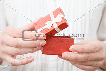 female opening gift box