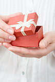 female opening gift box