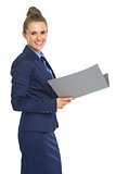 Portrait of smiling business woman with documents